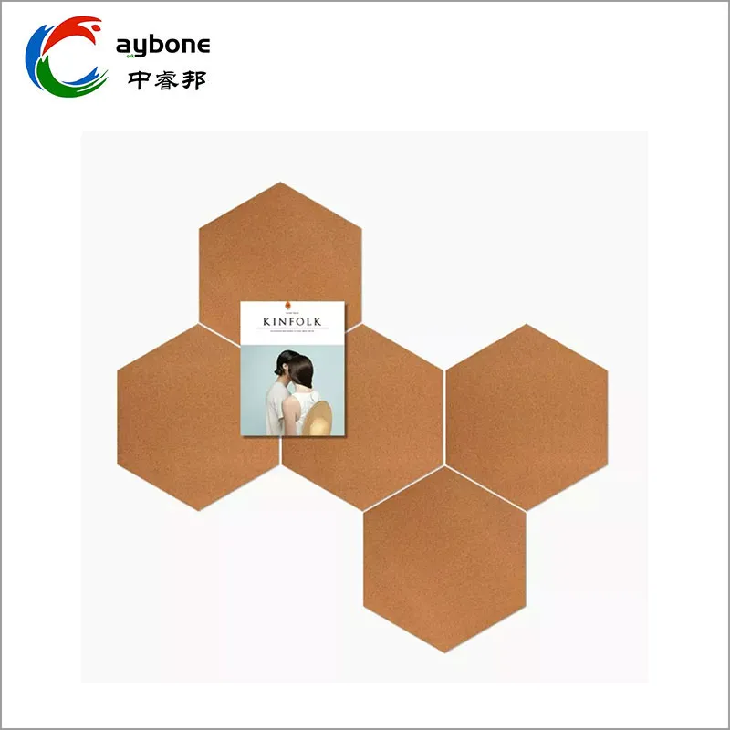 Hexagon Cork Board Tiles Self Adhesive Pin Board arranged on a wall